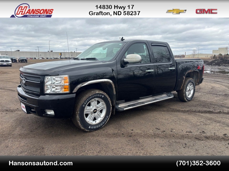 2011 Chevrolet Silverado 1500 LT in Black — front three-quarter view