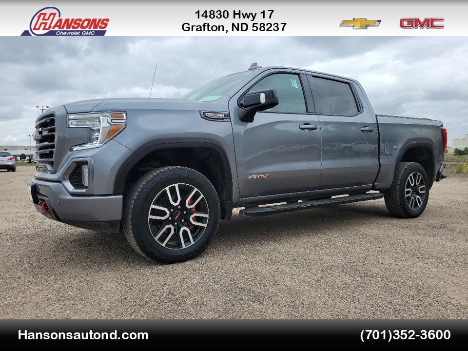 2021 GMC Sierra 1500 AT4 in Satin Steel Metallic — front three-quarter view